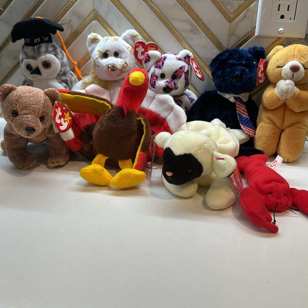 9 vintage rare Beanie Babies with swing tags and tush tags all sold together.